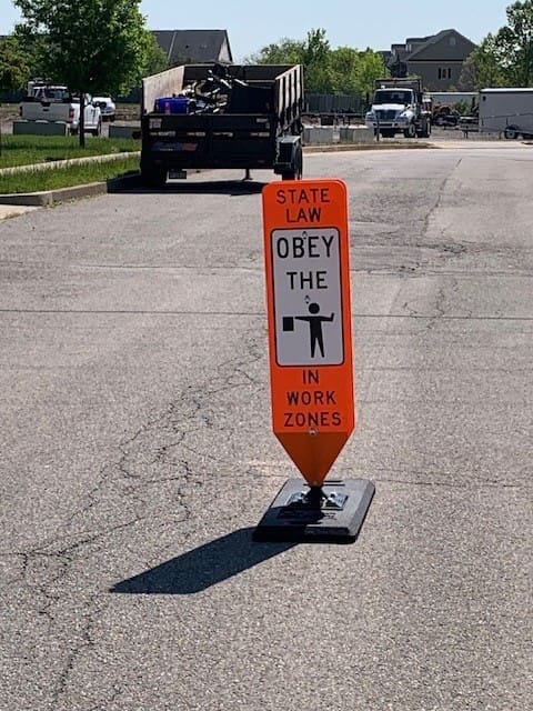 In-Street Flagger Warning Sign